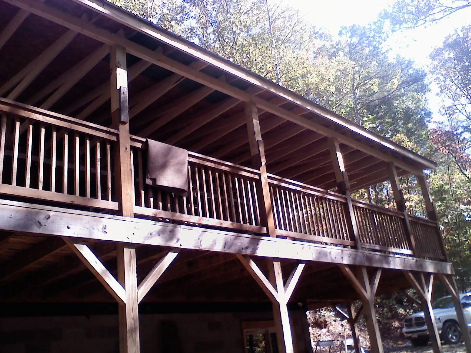 Timber framing under a new elevated porch and deck — Roof Leak Repair in Bend by Roofing Brothers